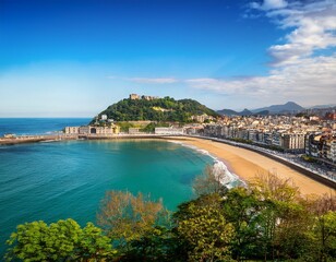 Fototapeta premium tranquil coastal view of san sebastian with monte urgull and historic buildings