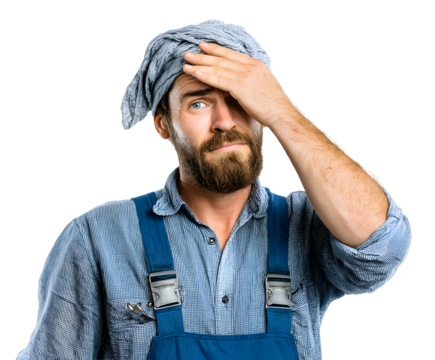 A worried construction worker wearing a blue uniform and a gray rag on his head has his hand on his forehead. He appears stressed.