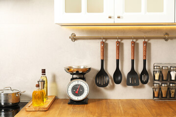 Retro mechanical kitchen scale, other utensils and spices indoors