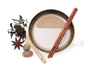 Aromatic Masala tea in cup, dry leaves and spices isolated on white, top view