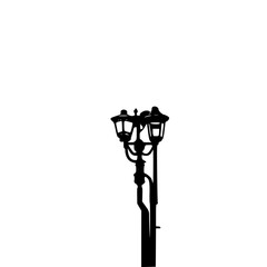 Vintage street lamp silhouette on a white background  
