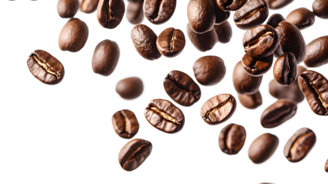 A bunch of coffee beans are flying through the air. The beans are scattered in different directions, creating a sense of movement and energy. The image conveys a feeling of excitement and liveliness