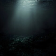 Mysterious Depths: Sunlight filters down into a dark and vast ocean, illuminating the shadowy seabed, creating a captivating scene of the deep blue sea.