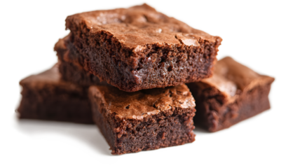 A stack of brownies on a white background. The brownies are cut into squares and are piled on top of each other