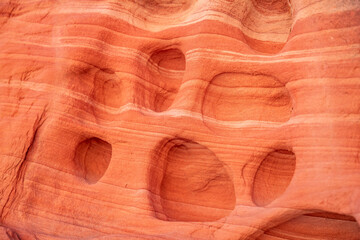 Aztec Sandstone(Jurassic) geological formation.  Tafoni / Haloclasty (salt weathering). Scenic Loop Dr, Red Rock Canyon National Conservation Area, Las Vegas, Clark County, Nevada. Mojave Desert. 
