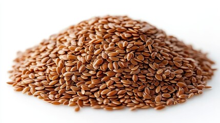 Obraz premium top view of a small heap of golden brown flax seeds,a smooth surface isolated on a transparent background