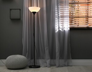 Beautiful curtains on window in stylish room interior