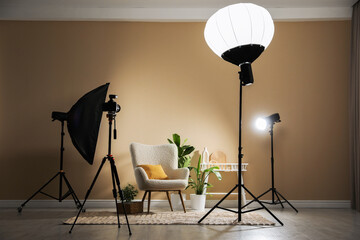 Professional photo studio equipment prepared for shooting living room interior
