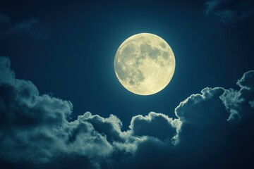 Obraz premium Full moon shines brightly in the night sky with clouds.