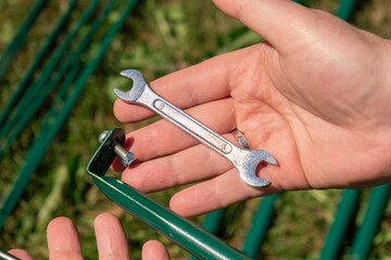 Assembling a garden garter for plants. Support and garter for plants. Accessories and tools for gardening