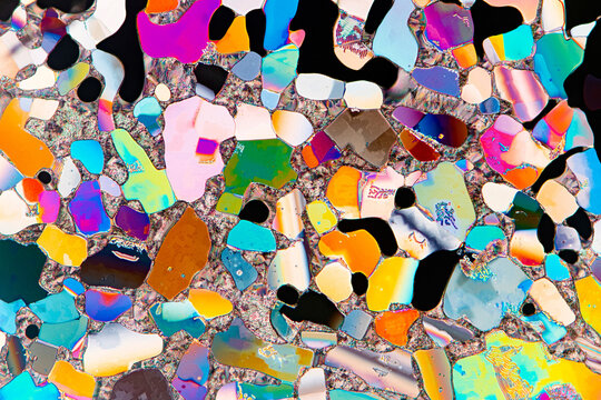 Liquid crystals magnified, displaying a vibrant color spectrum