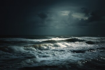Obraz premium Towering, dark waves crash under a dramatic, moonlit sky, creating a moody seascape captured with a slow shutter for a dynamic, stock-quality image.
