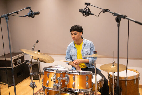 Drummer Performing in Professional Recording Studio