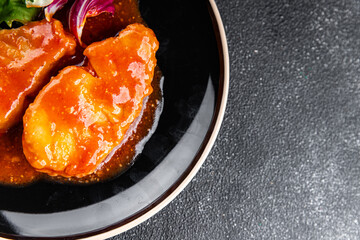 Fish tomato sauce white fish fillet dish organic fresh tasty gourmet food background on the table rustic food top view copy space