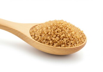 A wooden spoon filled to the brim with brown sugar granules on a white background studio shot