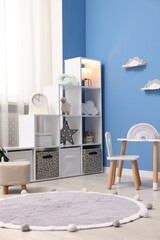 Child's room with stylish furniture and toys. Interior design
