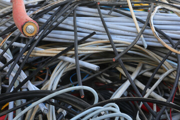 old electric cable and other used cables in the special waste collection center for the correct...