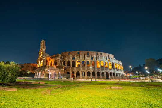 Colosseum at night in Rome, Italy - Powered by Adobe