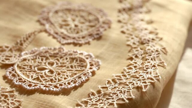 Exquisite Beige Lace Doilies on Linen Fabric Background Detailed Close Up