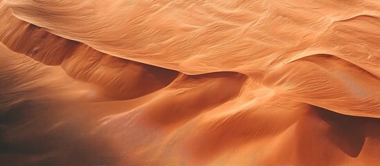 Obraz premium Desert dunes with sand textures. Used for adventure travel campaigns, geological studies, or minimalist photography.