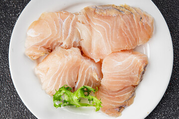 Rish fillet white fish raw seafood appetizer dish organic product fresh tasty gourmet food...