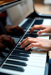 Obraz premium close up of two hands playing a piano