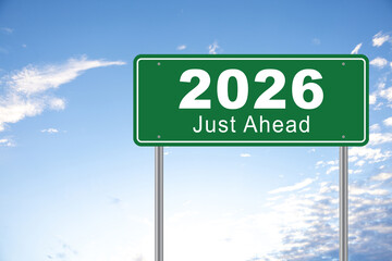 The new year 2026 or straightforward concept. number 2026 written on the road sign in forest. planning and challenge, business strategy, opportunity, hope, exit, and new life.