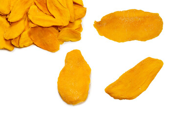 Dry tasty mango slices isolated on a white background.