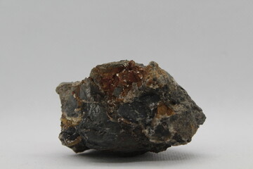 Pyrite in a rock isolated on a white background. natural silver pyrite gem on white background. Pyrrhotite or Pyrite from Baska, Frydek Mistek, Czech republic 