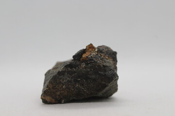 Pyrite in a rock isolated on a white background. natural silver pyrite gem on white background....