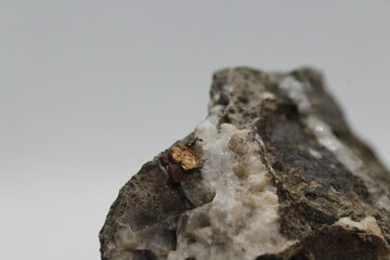 Pyrrhotite mineral isolated on a white background. Pyrite mineral isolated on a white background....