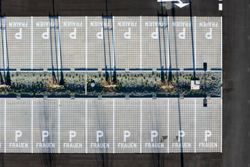 Parking lots for woman. Aerial top down view.