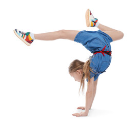 Girl in stylish clothes dancing on white background