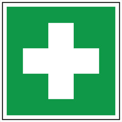 Obraz premium Green first aid cross symbol indicating location of medical assistance and emergency treatment