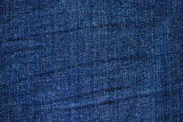 Naklejka premium Navy blue denim jeans background (texture)