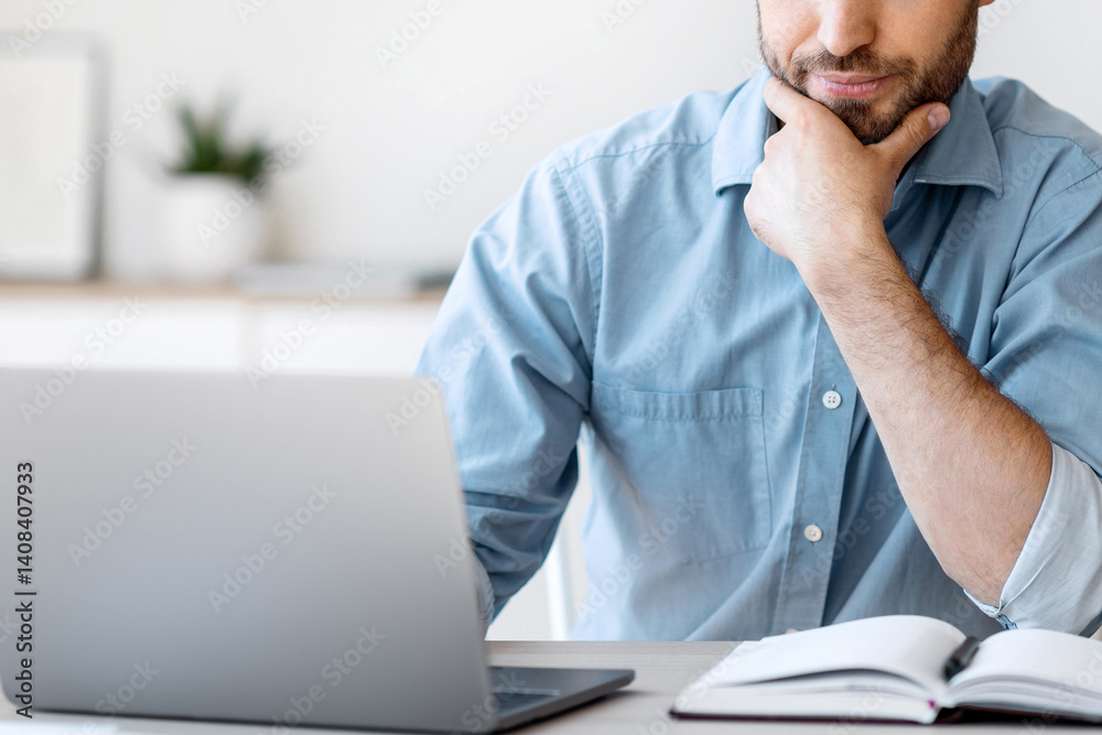 Poster thoughtful businessman working with computer in office, looking at laptop screen, thinking about bus