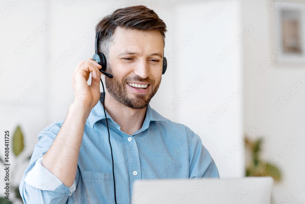 Poster hotline operator. handsome young man customer support manager in headset working with laptop compute