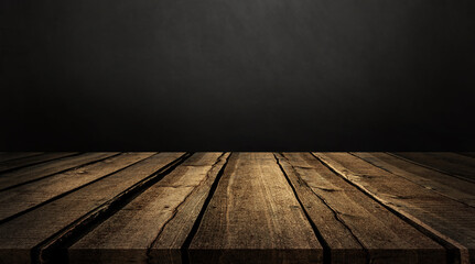 Empty wooden table on black stone wall background with light. Wooden texture