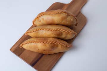 Malaysian pastry Karipap (Curry Puff) with chicken, potatoes, and hard boiled egg filling.