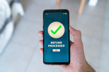 Refund processed notification on smart phone.