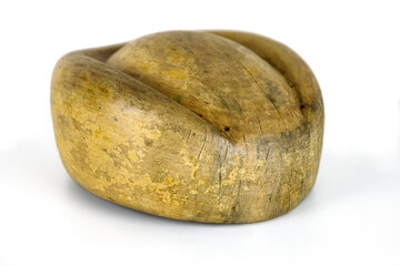 Antique millinery form for shaping pillbox hats. Vintage wooden block used in hat making. Craftsmanship, old professions, artisan work concept. Isolated on white background. Copy space