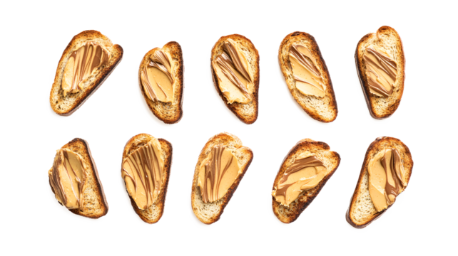 A close-up of a plate of peanut butter sandwiches. The sandwiches are all different sizes and shapes, but they all have peanut butter on them. The plate is arranged in a grid pattern