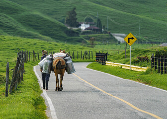 man and horse  walking in the mountains