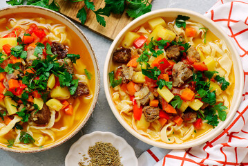Traditional Uzbek dish lagman made from vegetables, meat and noodles .