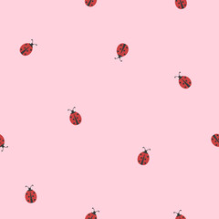 Cute seamless pattern with tiny ladybugs on a dusty pink background. Lovely minimalist vector backgrounds with small red bugs for textile, fabric, wallpapers, packaging, wrapping, kids apparel etc    