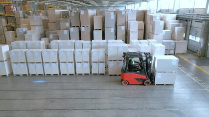 A forklift driver navigates the vast warehouse, highlighting the efficient organization and movement of goods in a storage facility. - Powered by Adobe
