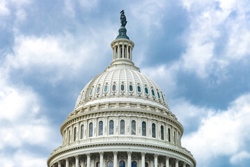 US Capitol in Washington, DC. Dome against a dramatic sky.