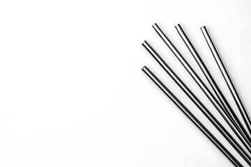 Metallic Straws on White Background for Eco-Friendly Lifestyle