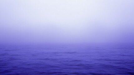Fototapeta premium Serene Misty Ocean Waves under Soft Purple Haze at Dusk