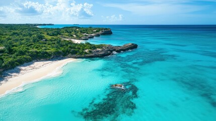 Obraz premium An aerial view reveals a pristine beach and turquoise ocean